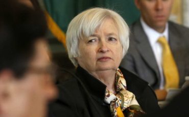 Poll: december Fed rate hike probability 70 percent, say economists